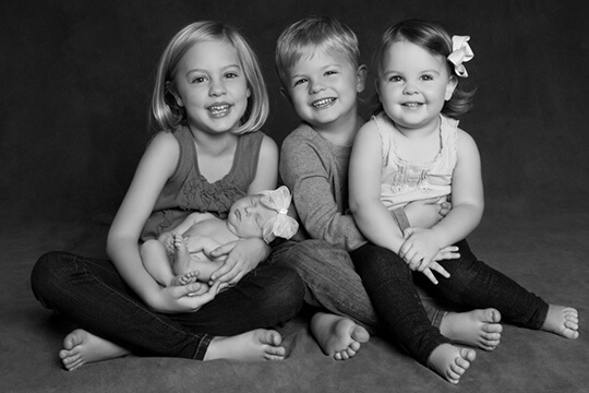 Four adorable kids smiling