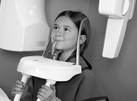 Little girl receiving panoramic x-rays