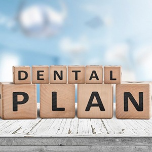 Blocks spell “dental plan”