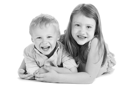 Young boy and girl smiling