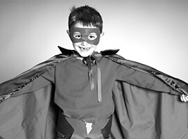 Little boy dressed as super hero
