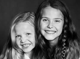 Two smiling young girls