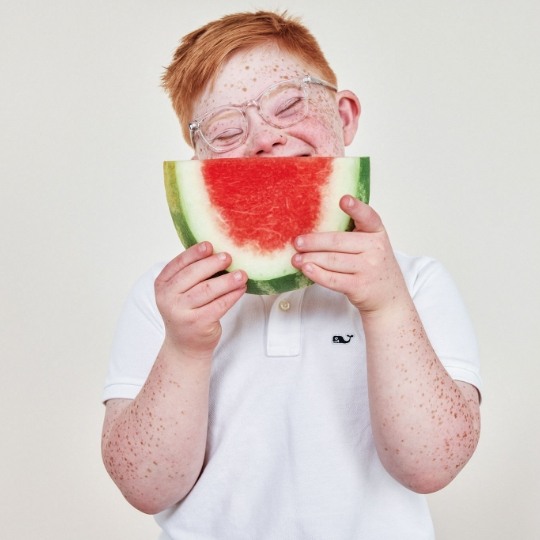 Young girl coloring at table