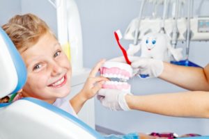 child having fun at dentist