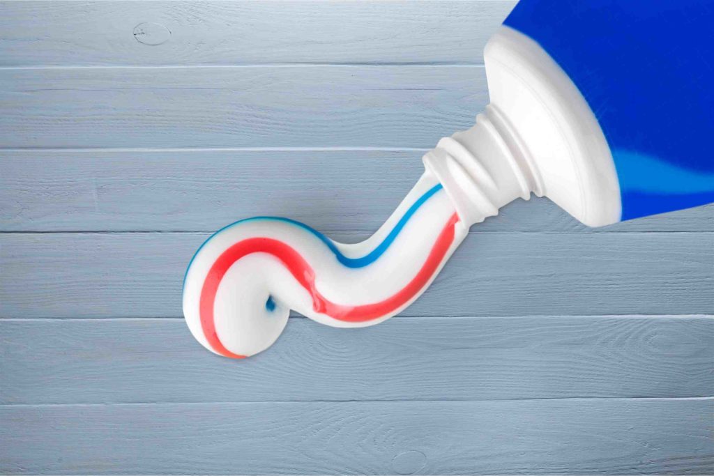 Squeezed out toothpaste that's used as an oral health tip for kids 