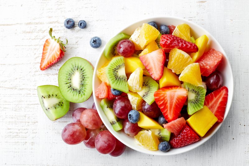 a bowl full of colorful and healthy fruit