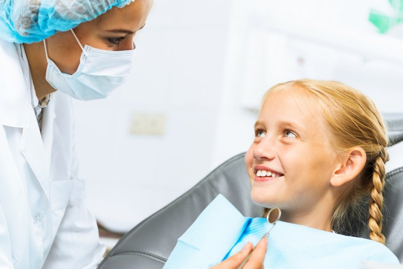 dentist discussing dental sealants 