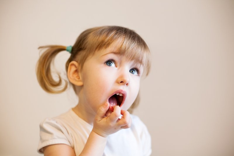 a two-year-old with mouth open