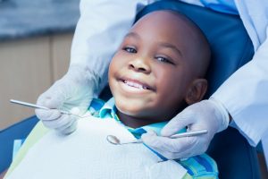 a child having his teeth cleaned